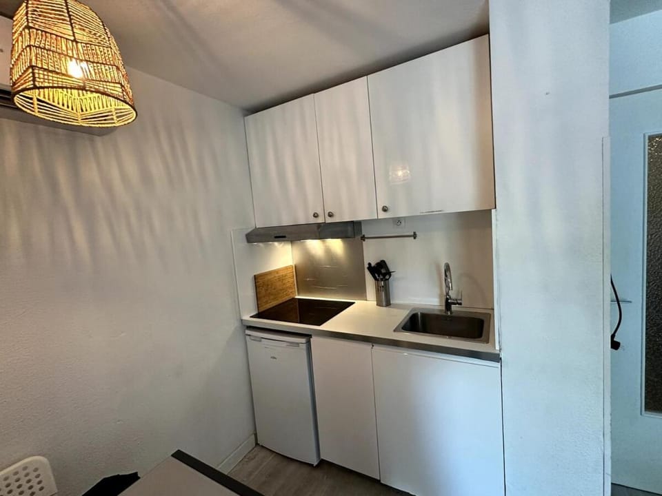 Kitchen or kitchenette, stove