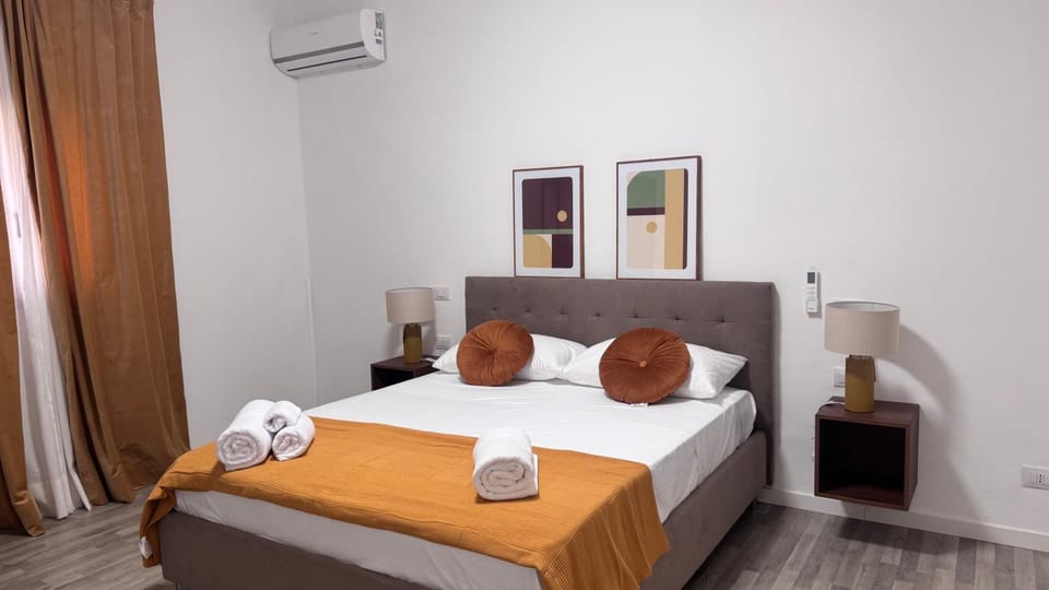 Bed, Photo of the whole room, Bedroom, towels, air conditioner