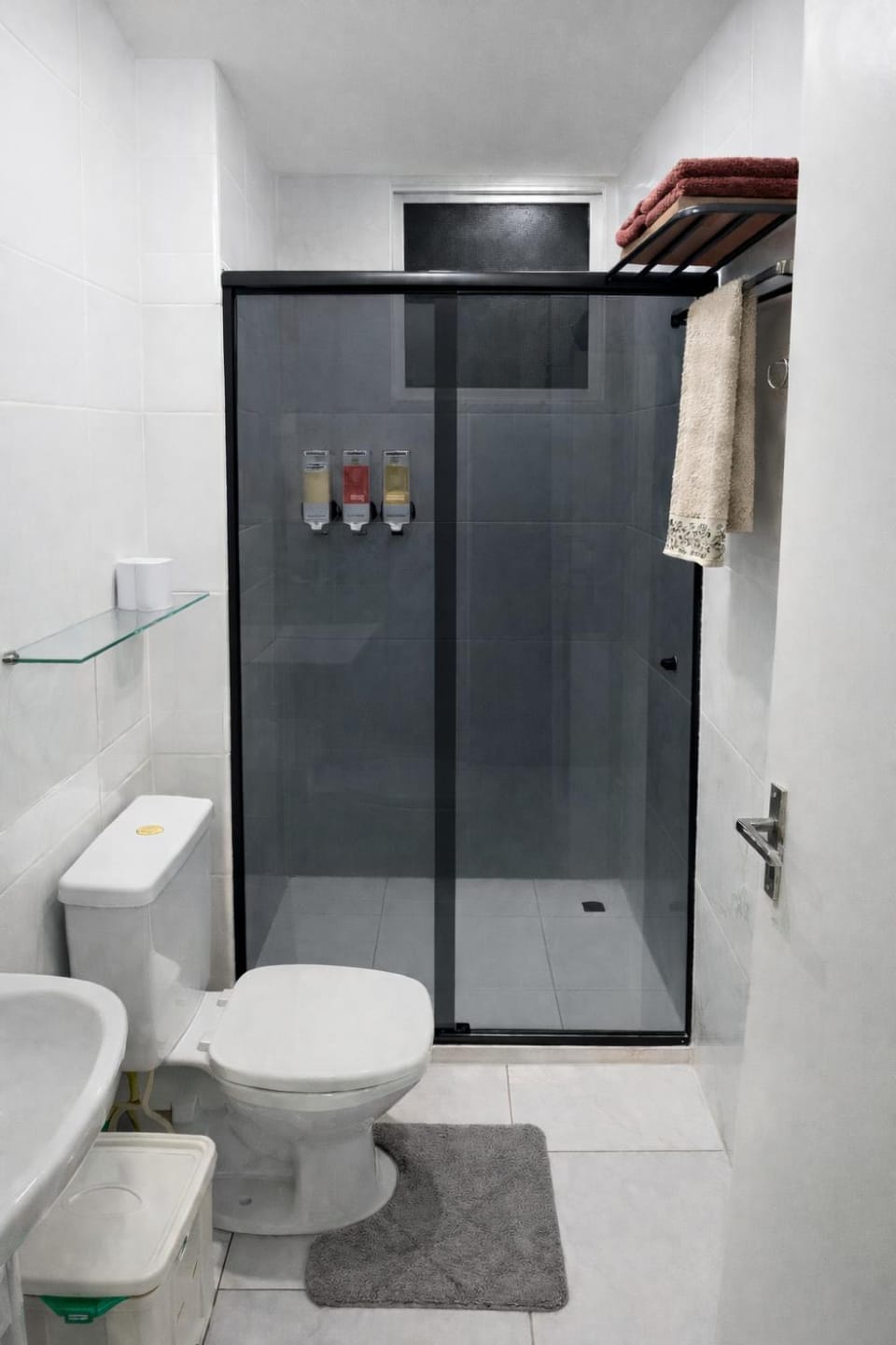 Shower, Toilet, Bathroom, hair dryier, towels