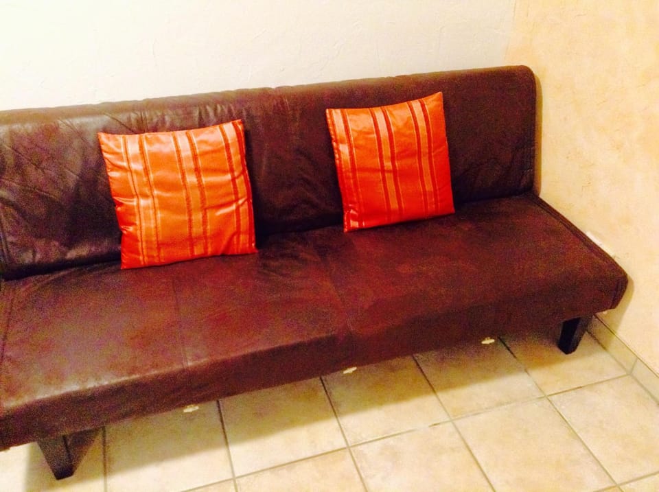 Bed, Living room, Seating area