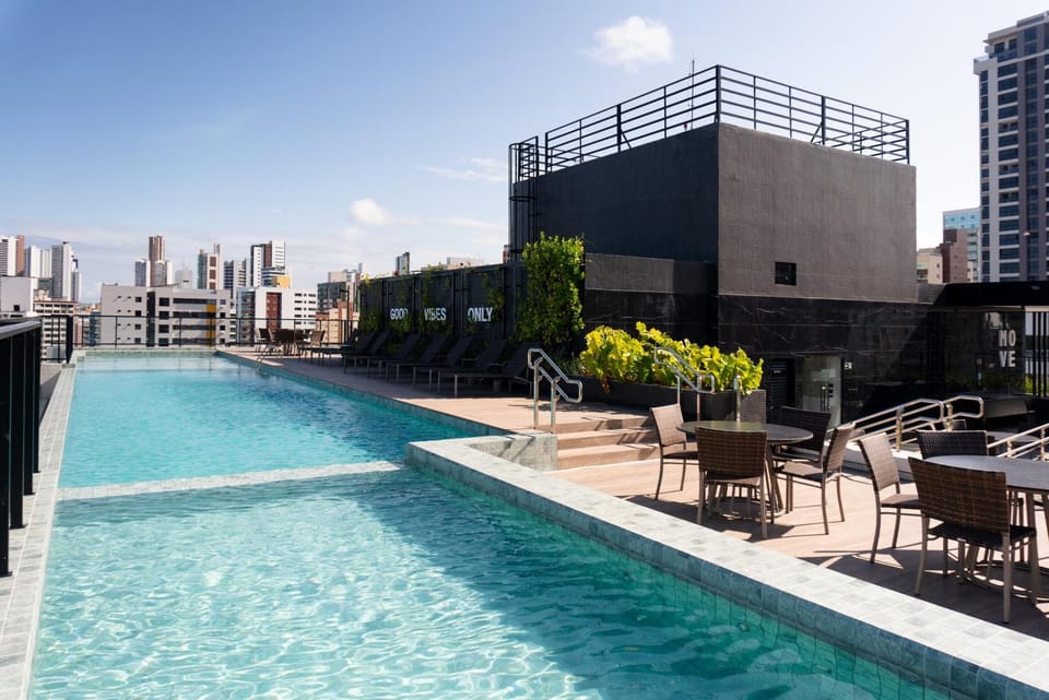 Property building, Day, Pool view, Swimming pool, Swimming pool, sunbed
