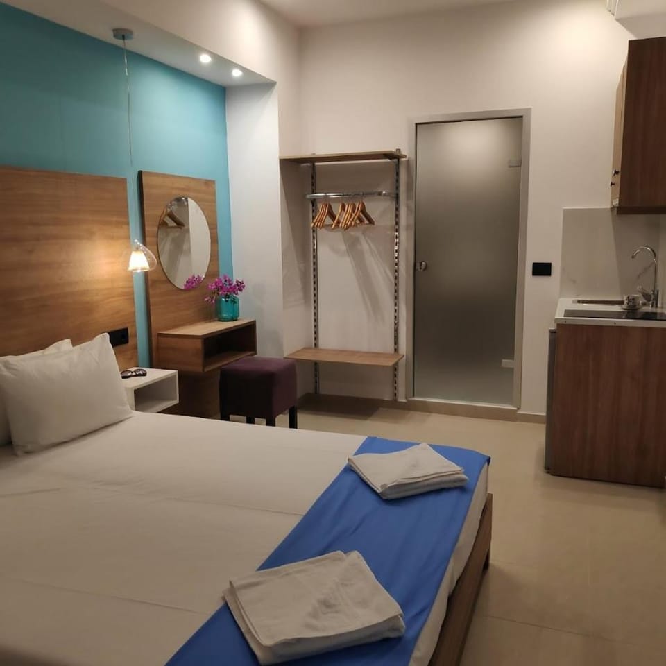 Bed, Kitchen or kitchenette, Bedroom, towels, wardrobe