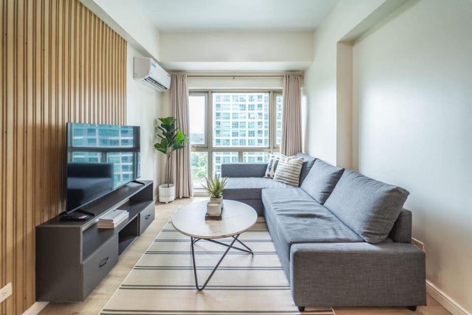 Scandi 1 BR Home Golf View BGC Apartment in Makati