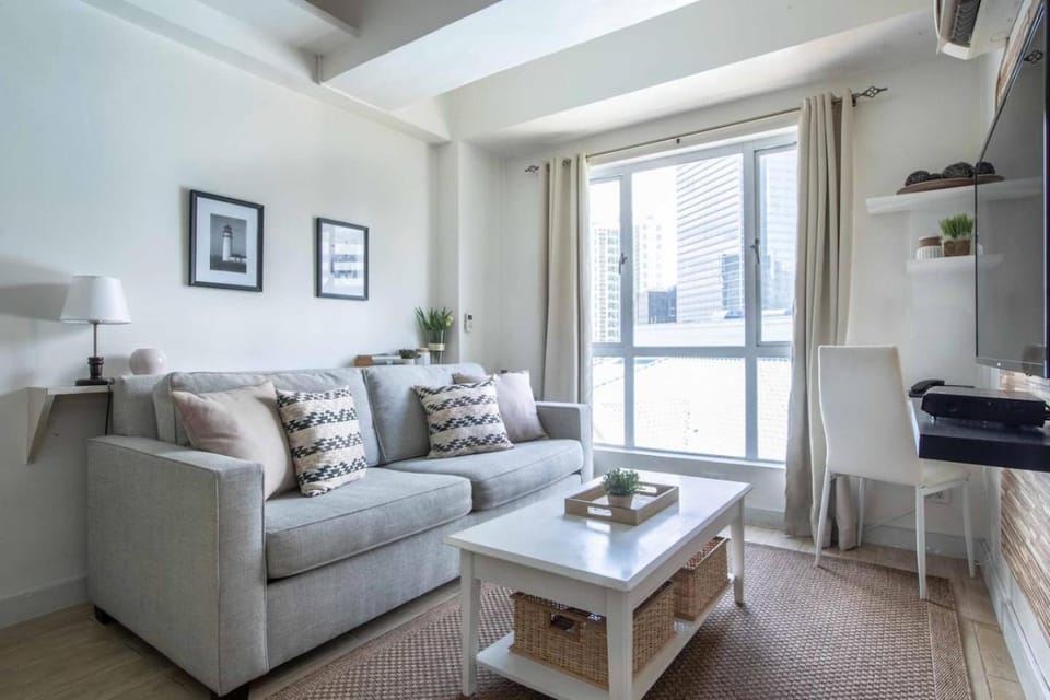 Julias Bright Stylish Condo Balcony Apartment in Makati