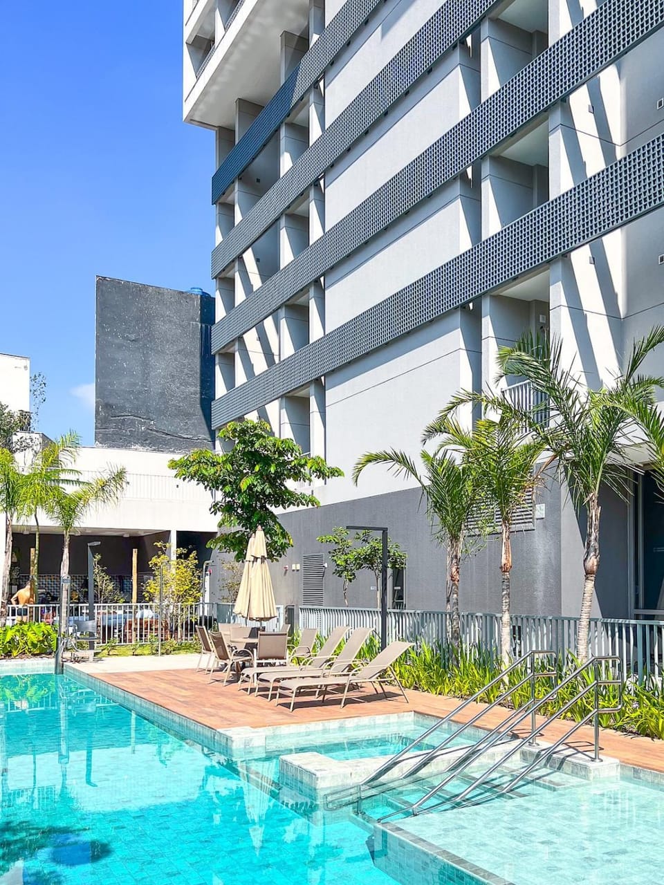 Property building, Pool view, Swimming pool, sunbed