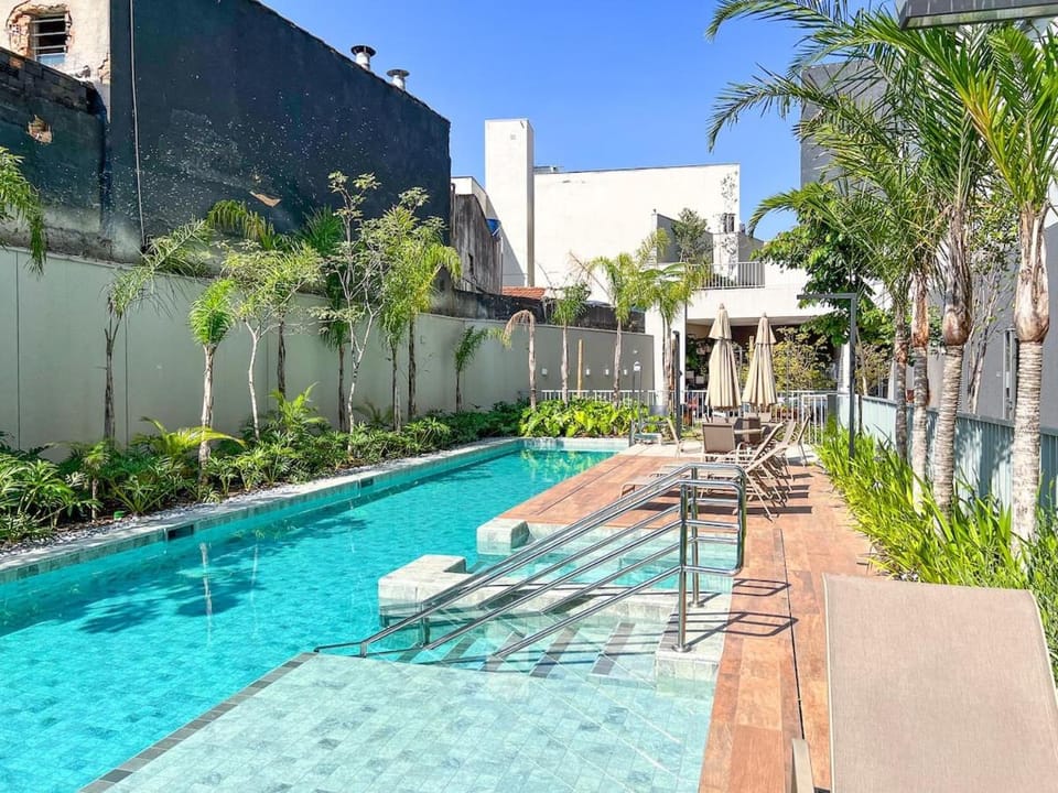 Property building, Pool view, Swimming pool, sunbed