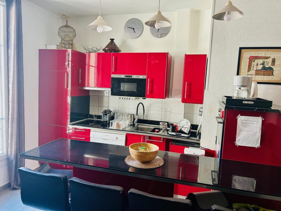 Kitchen or kitchenette, dishwasher, oven, stove, toaster
