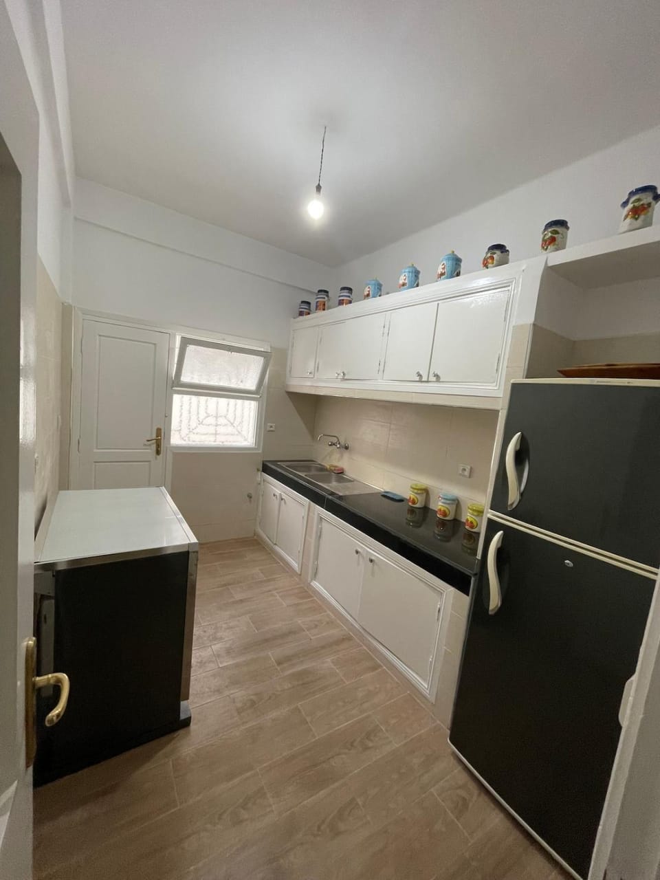 Kitchen or kitchenette, oven, stove