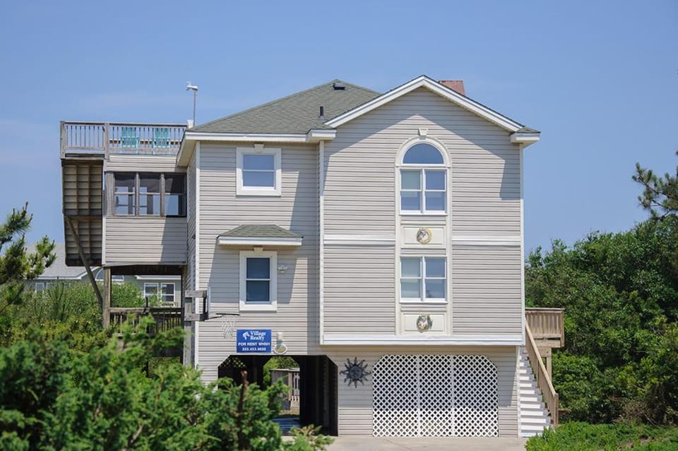 Follow The Sun by Village Realty House in Corolla