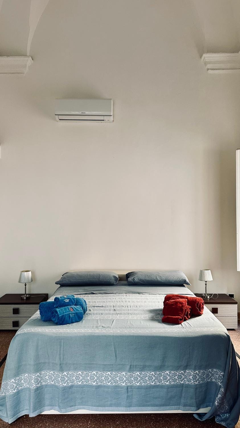 Bed, Photo of the whole room, Bedroom, towels, air conditioner