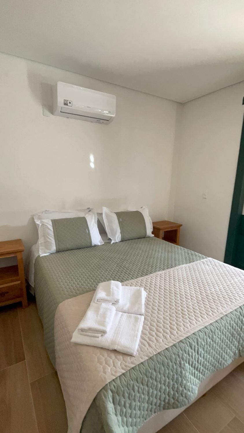Bed, Photo of the whole room, towels, air conditioner