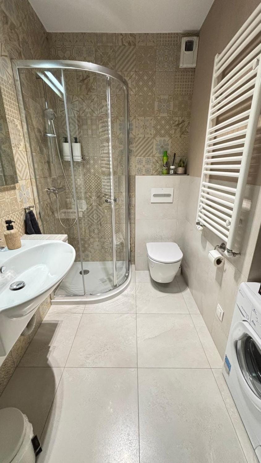 Bathroom, flat iron, hair dryier, washing machine, dryer