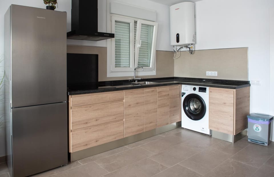 Kitchen or kitchenette, washing machine