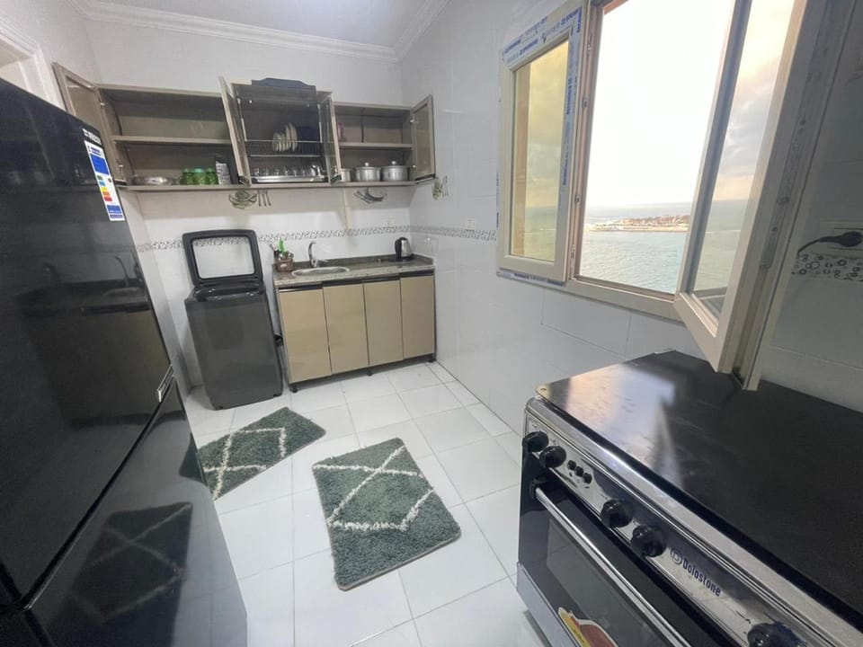 Kitchen or kitchenette, oven, stove