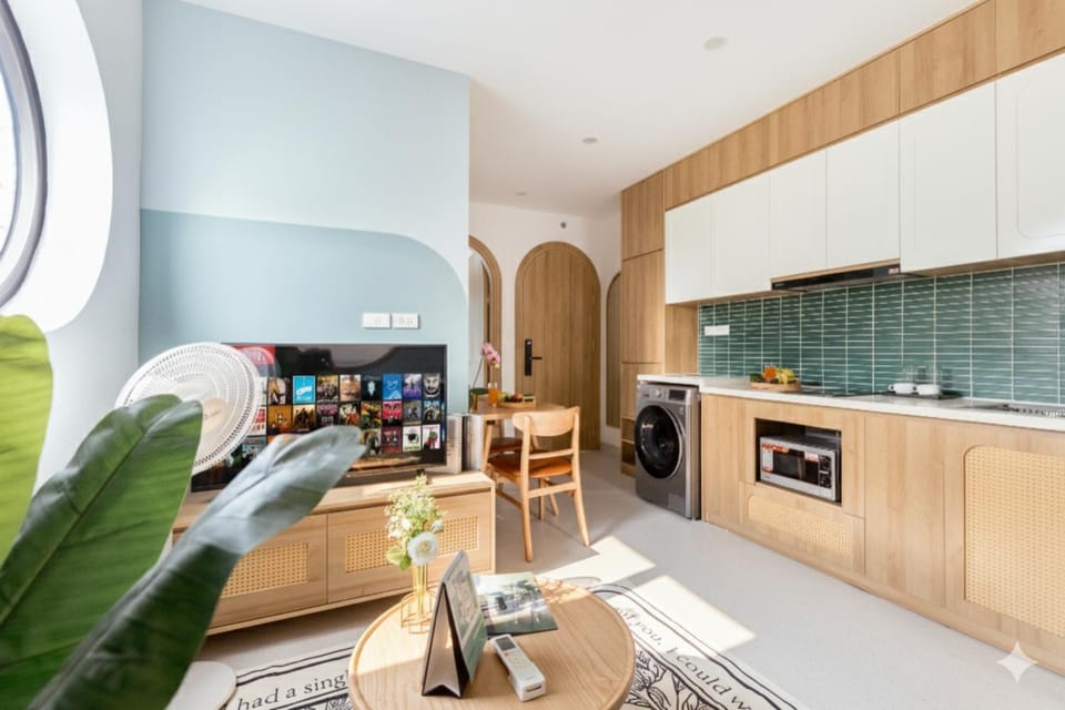 TV and multimedia, Kitchen or kitchenette, Living room, Seating area, stove, washing machine, dryer
