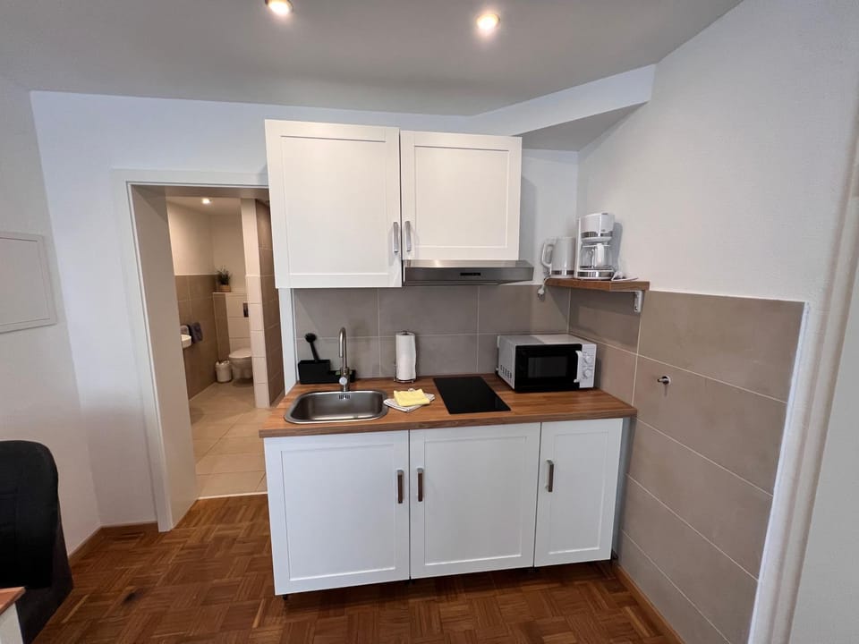 Kitchen or kitchenette, stove