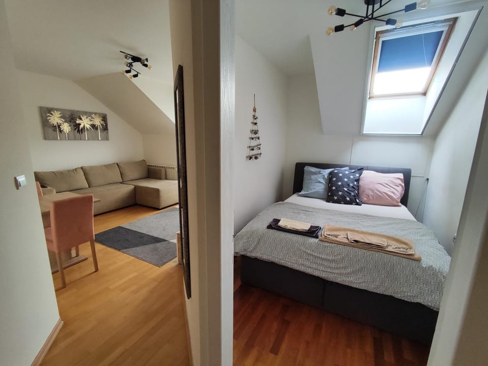 Bed, Living room, Seating area, Bedroom