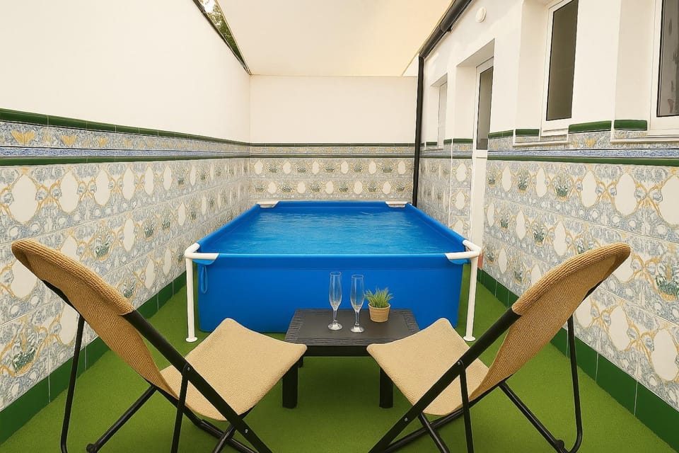 Property building, Living room, Swimming pool