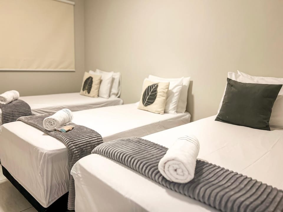 Bed, Photo of the whole room, Bedroom, towels, air conditioner