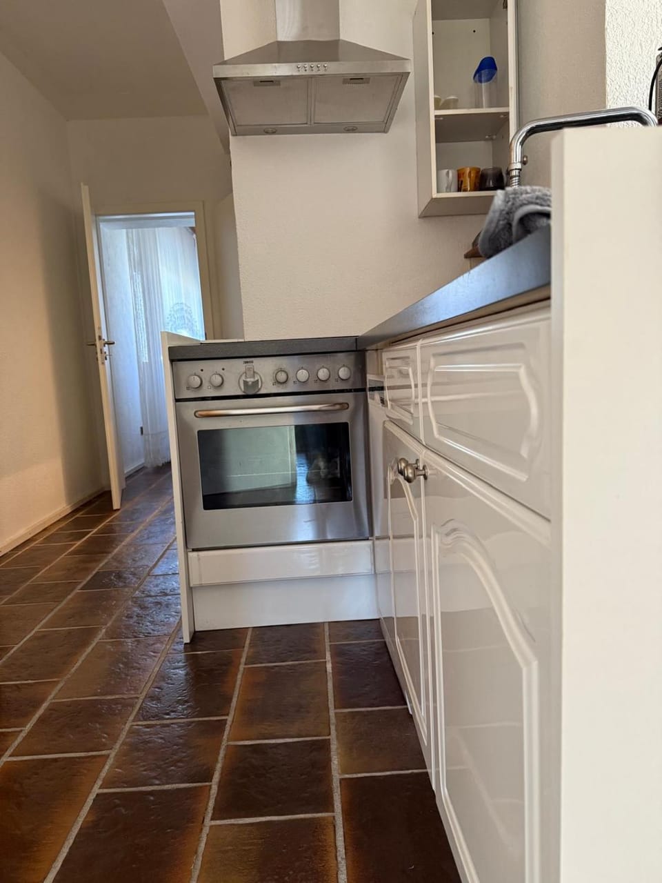 Kitchen or kitchenette, oven, stove