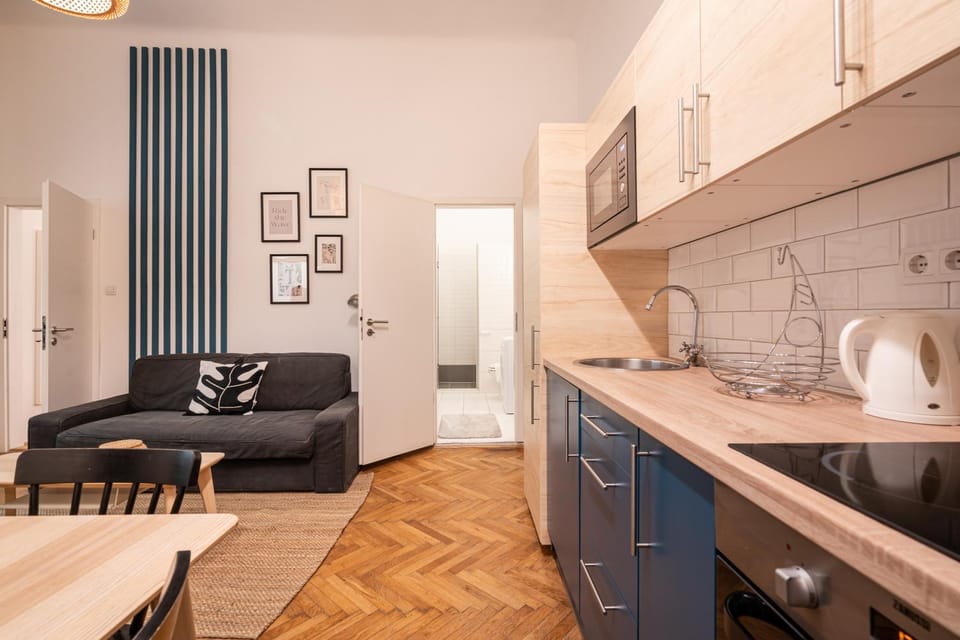 Kitchen or kitchenette, Living room, Seating area, furniture, minibar, stove