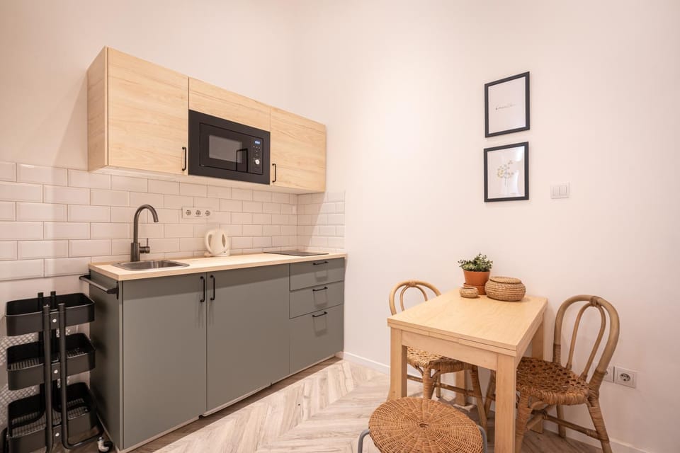Kitchen or kitchenette, Dining area, furniture, microwave, oven, stove