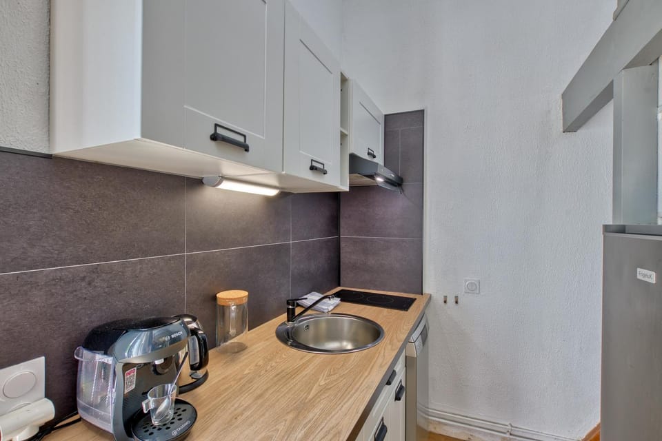 Kitchen or kitchenette, stove