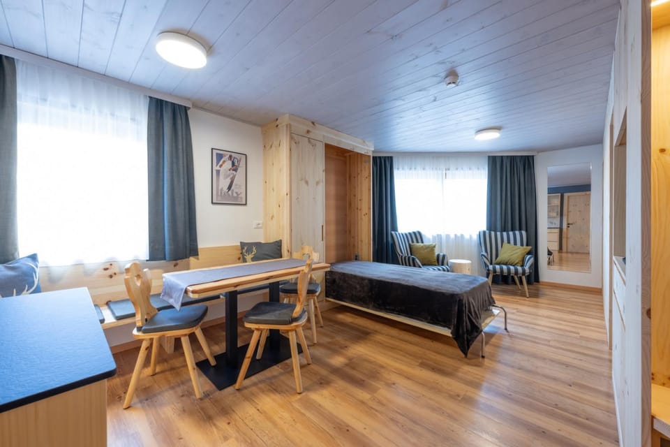 Bed, Living room, Dining area