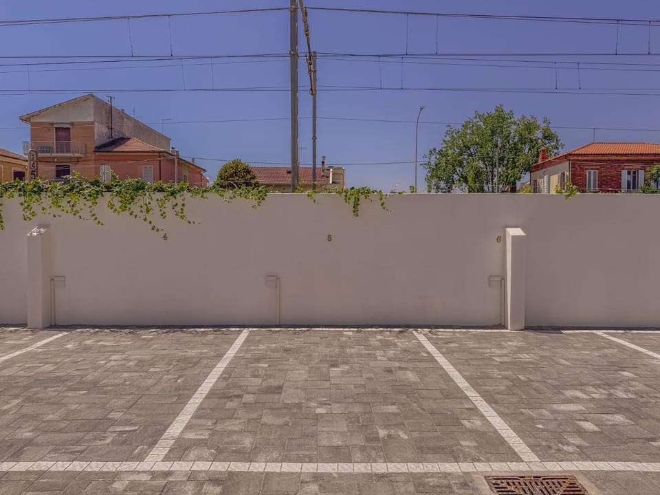 Beachfront with AC & Private Parking by HostHero Apartment in Civitanova Marche