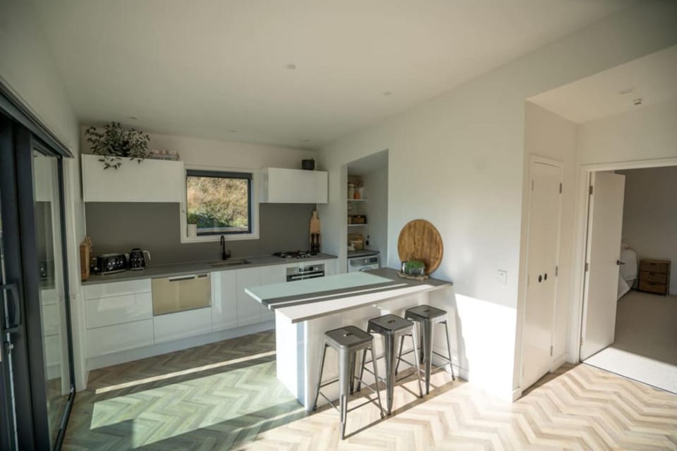 Sunny self contained unit in Shotover Apartment in Queenstown