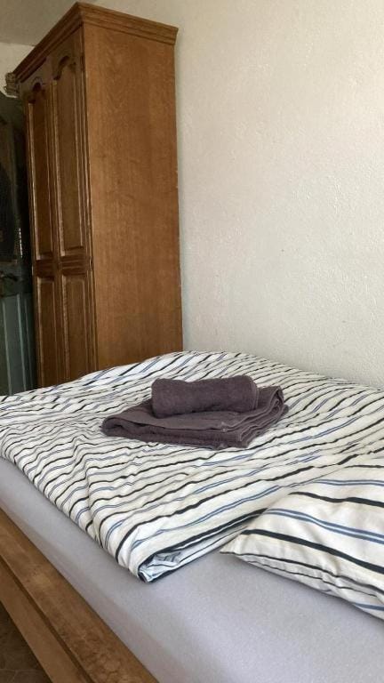 Bed, Photo of the whole room, Bedroom, towels, wardrobe