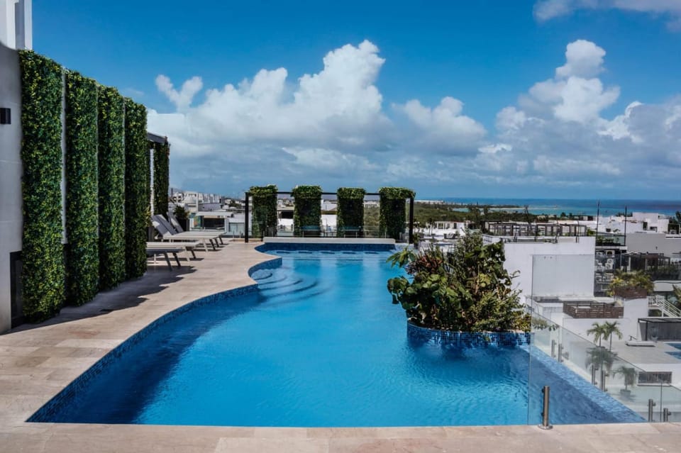 Property building, Day, Pool view, Sea view, Swimming pool, sunbed