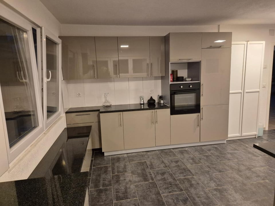 Kitchen or kitchenette, oven