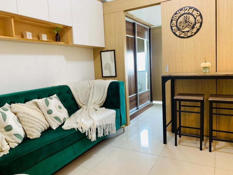 Cozy 1 BR 8 mins away SM north Apartment in Quezon City
