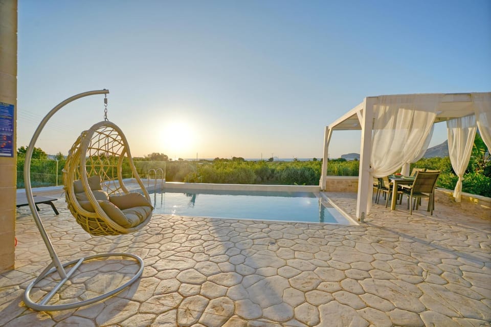 Patio, Day, Natural landscape, Pool view, Swimming pool, Sunset, sunbed