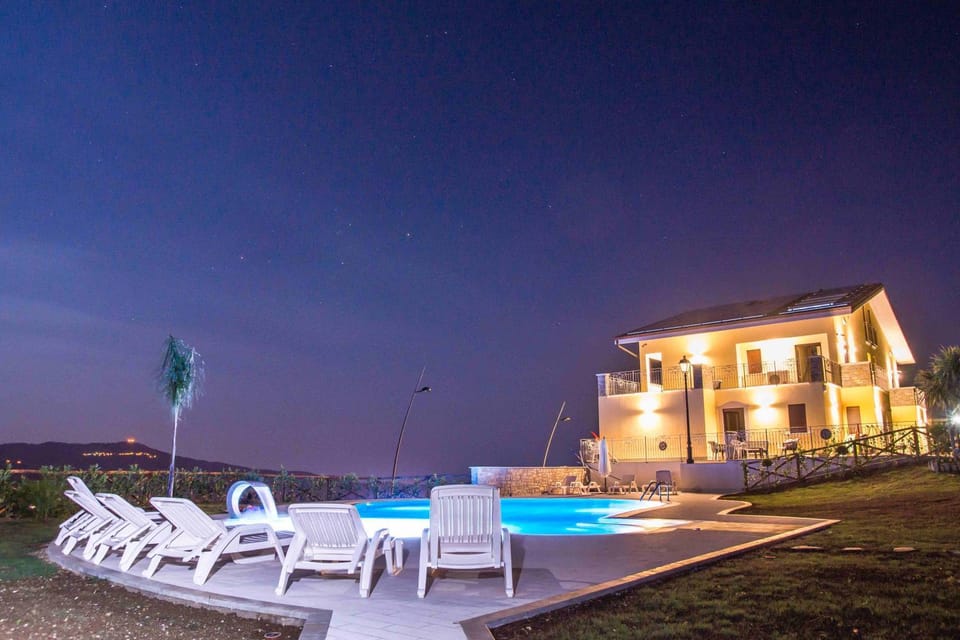 Property building, Swimming pool, Sunset