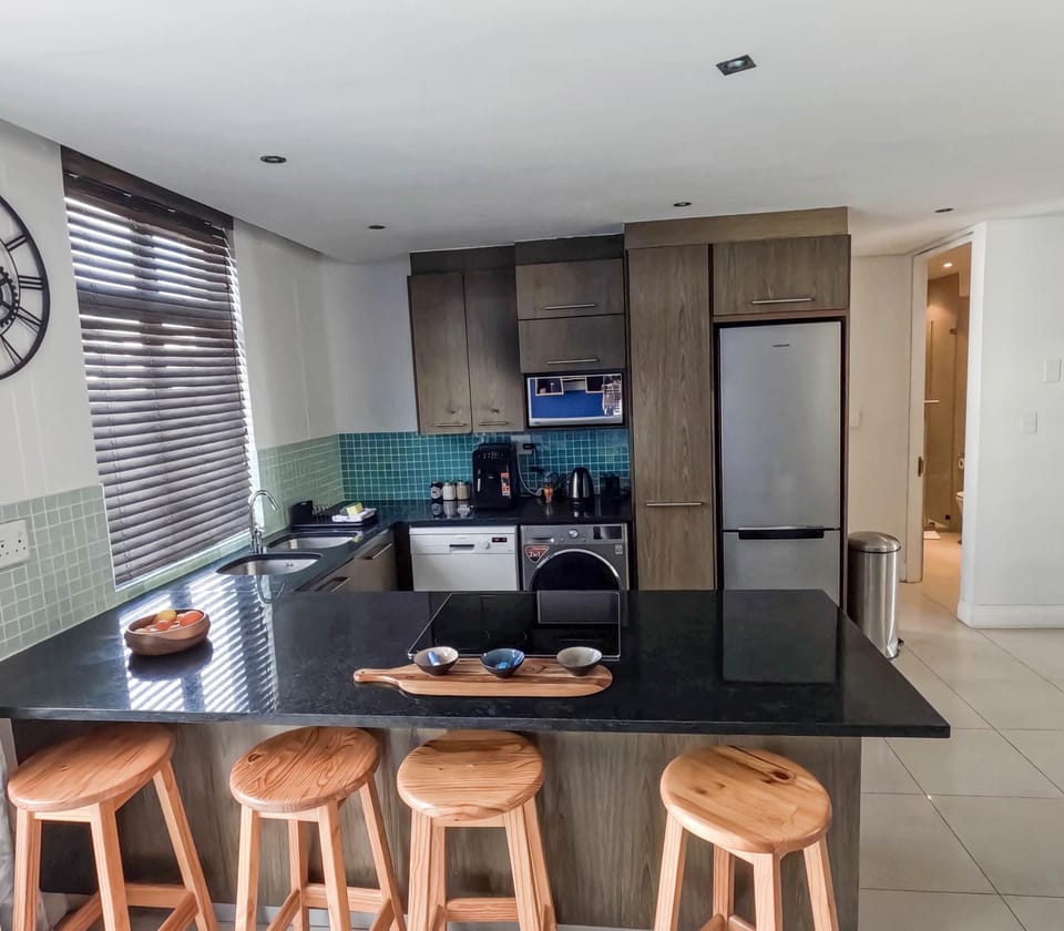 Kitchen or kitchenette, dishwasher, washing machine