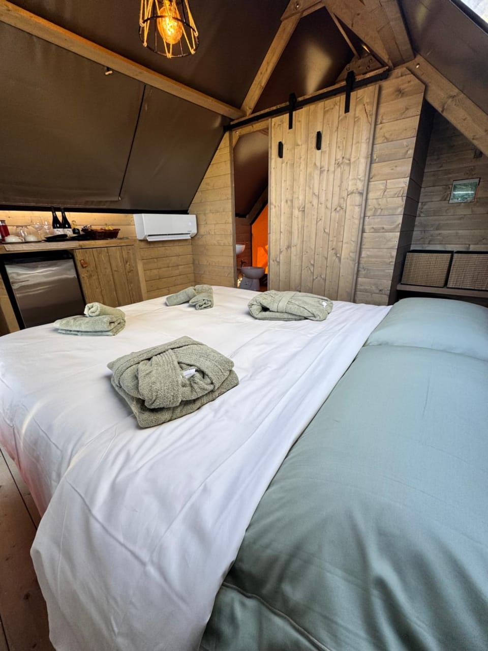 Bed, Photo of the whole room, Bedroom, towels, air conditioner