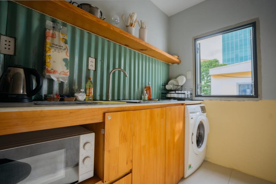 Kitchen or kitchenette, washing machine