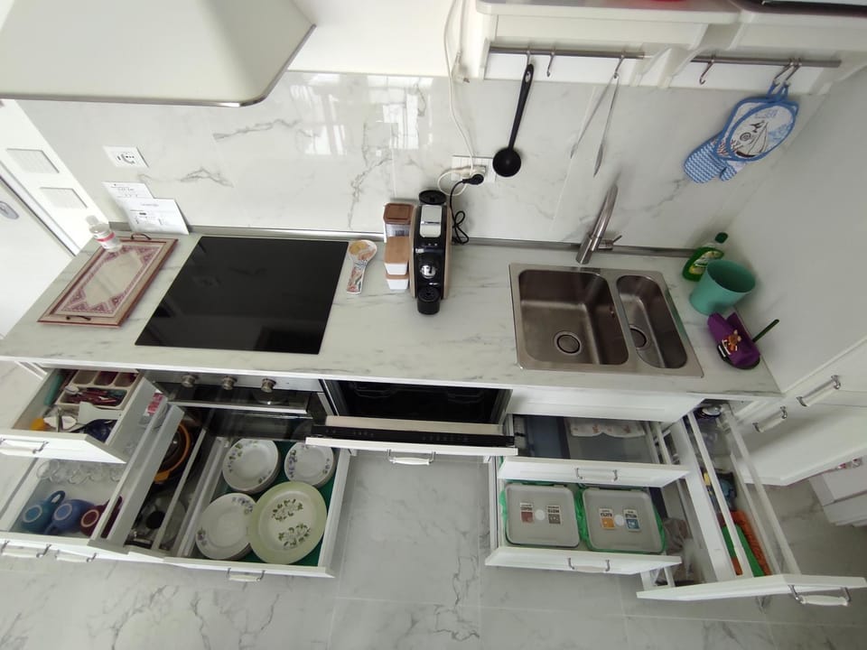 Kitchen or kitchenette, oven, stove