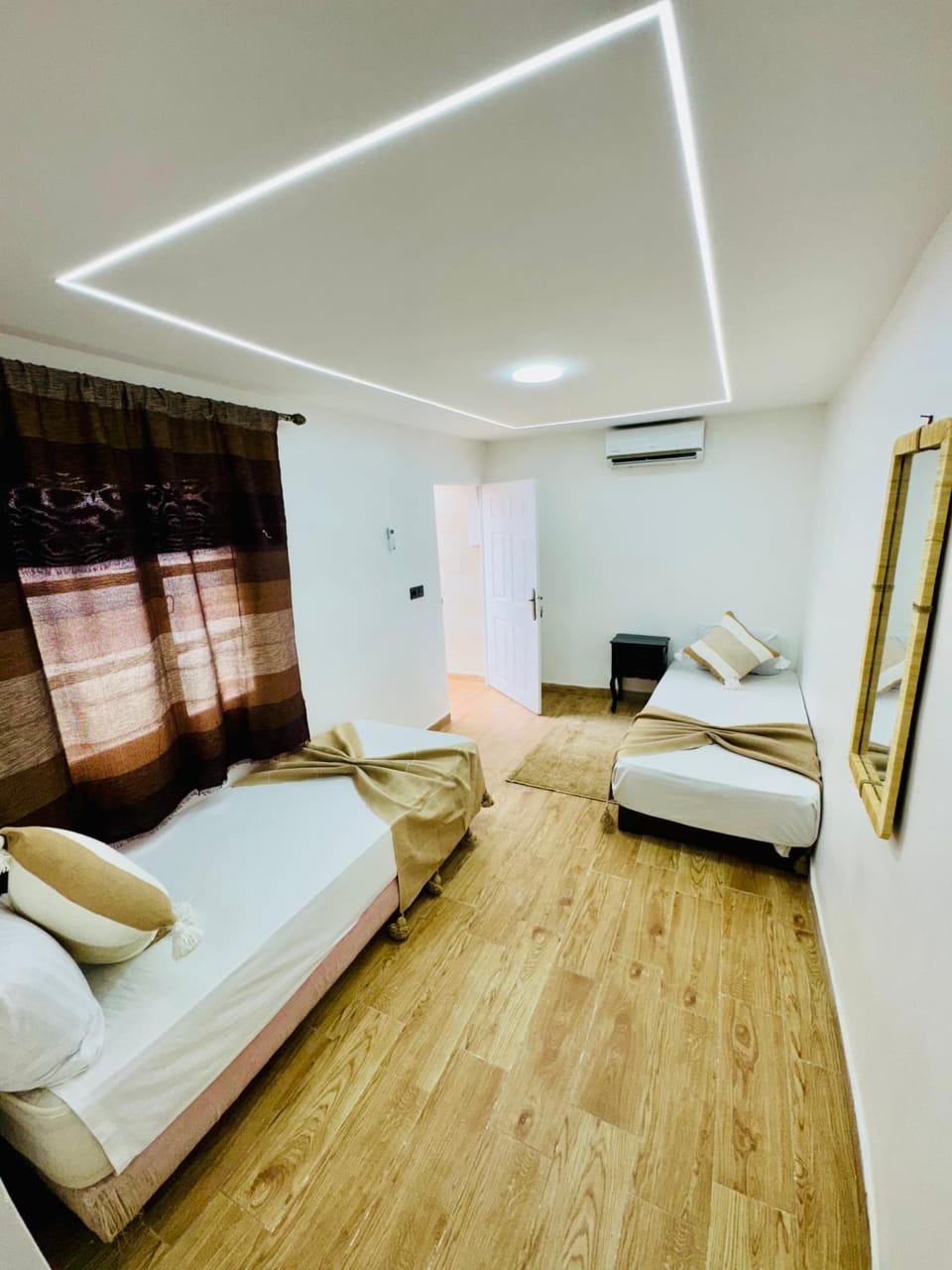 Bed, Living room, Seating area, Bedroom, air conditioner