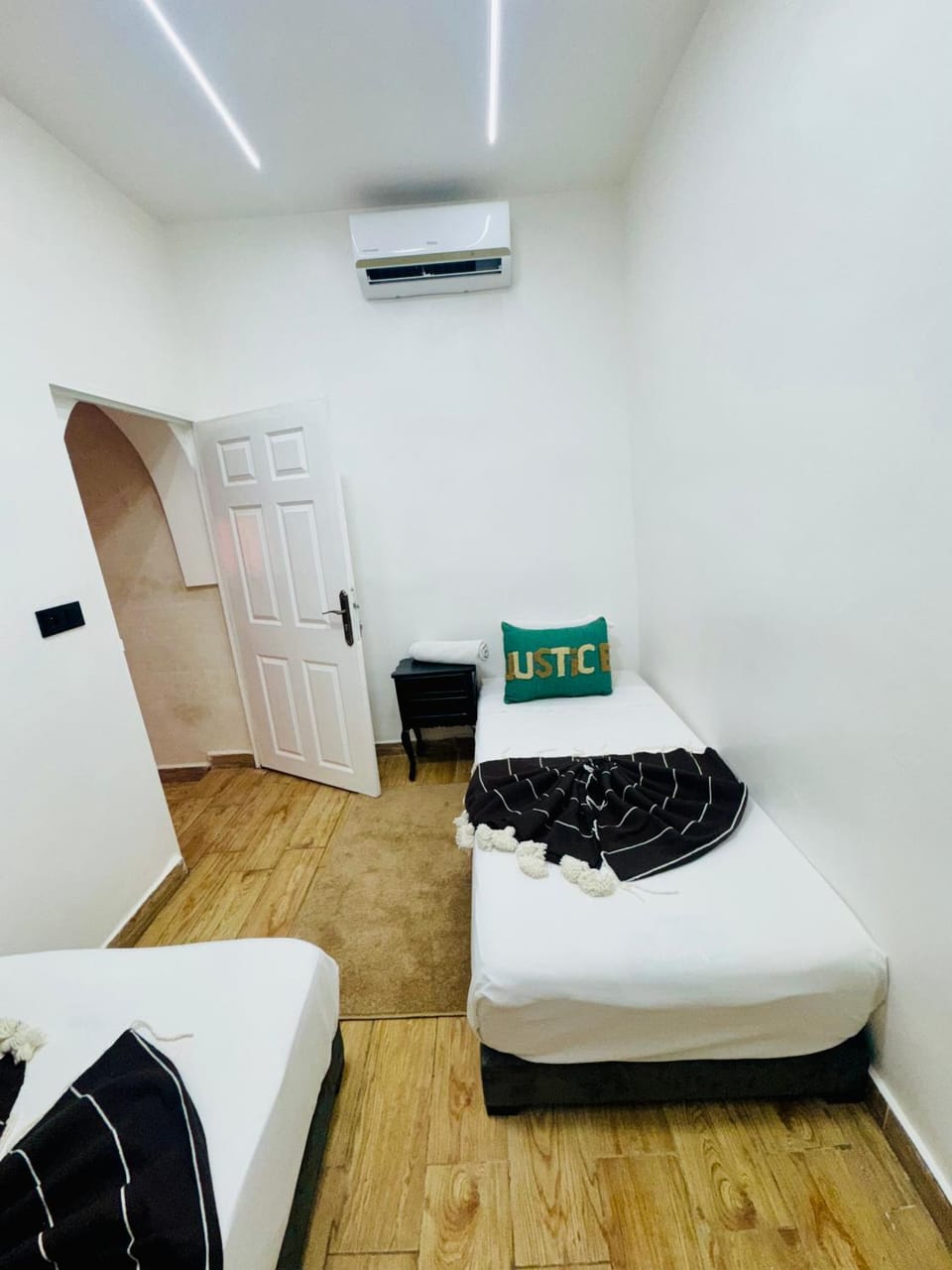 Bed, Living room, Seating area, Bedroom, air conditioner