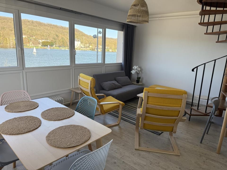 Natural landscape, Living room, Seating area, Dining area, River view