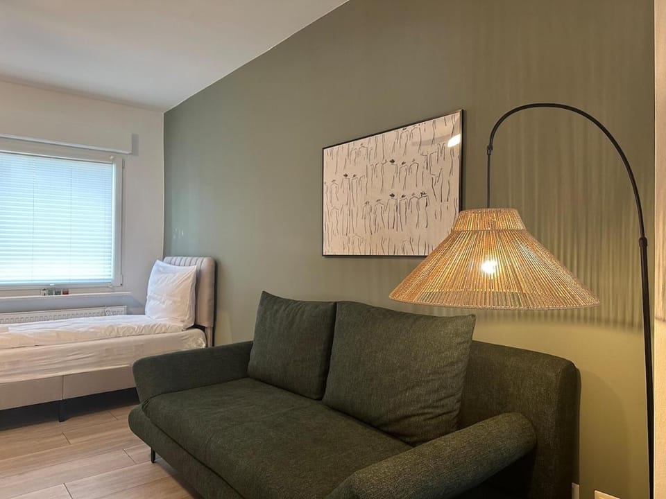Bed, Living room, Seating area, Bedroom
