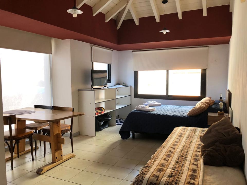 Bed, TV and multimedia, Living room, Seating area, Dining area, Bedroom