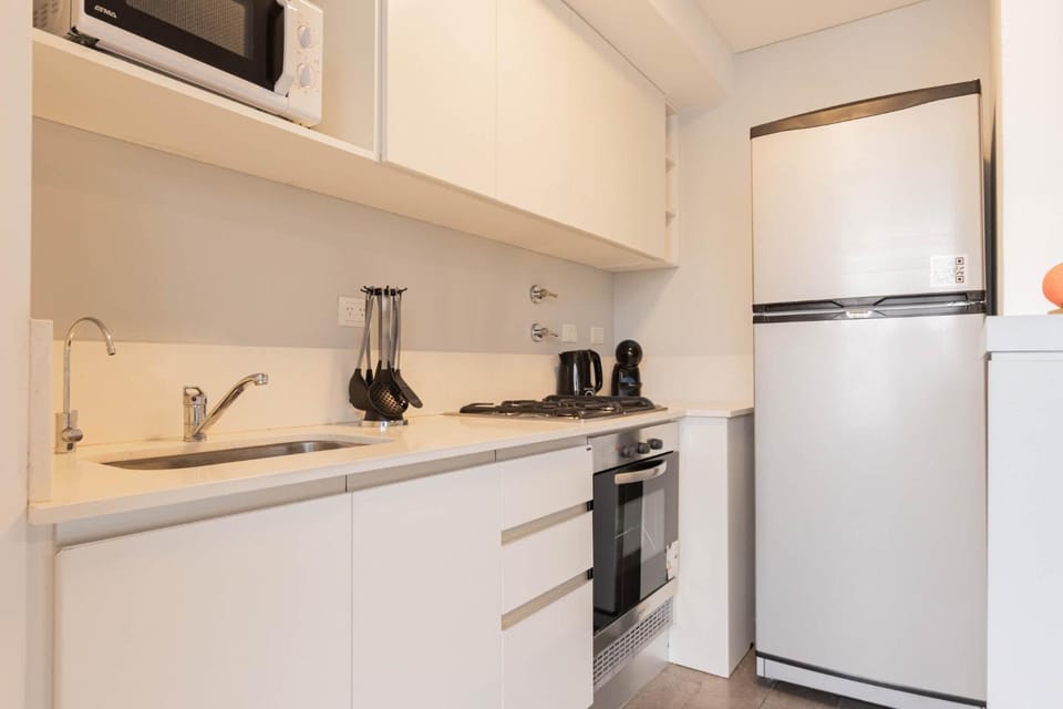 Kitchen or kitchenette, oven, stove, toaster