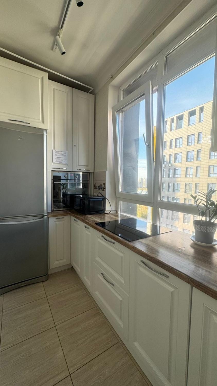 Kitchen or kitchenette, oven, stove