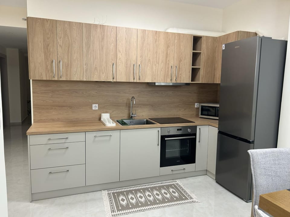 Kitchen or kitchenette, dishwasher, oven, stove, toaster