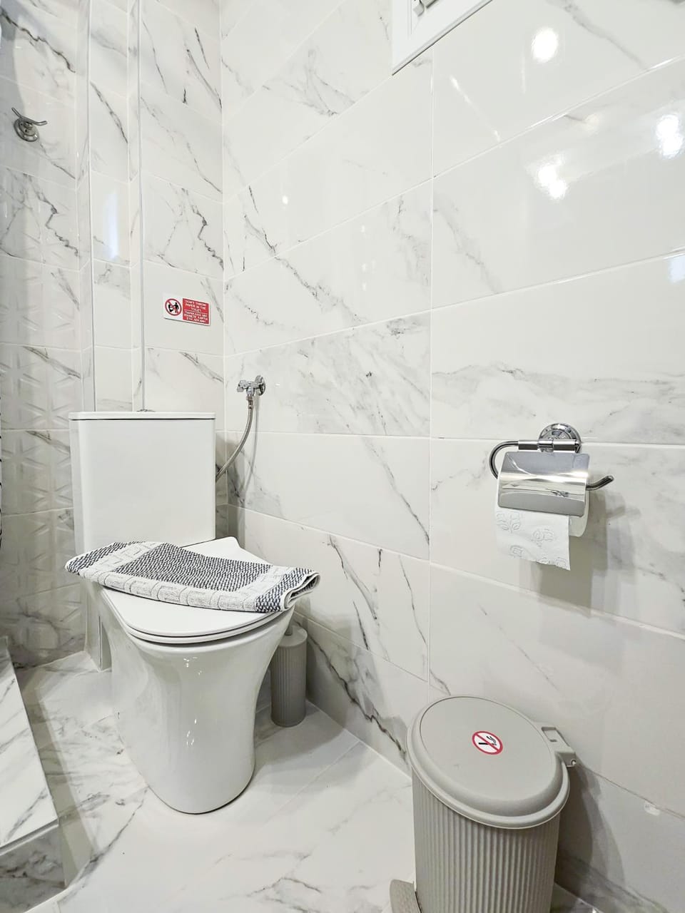 Shower, Toilet, Bathroom, hair dryier, towels