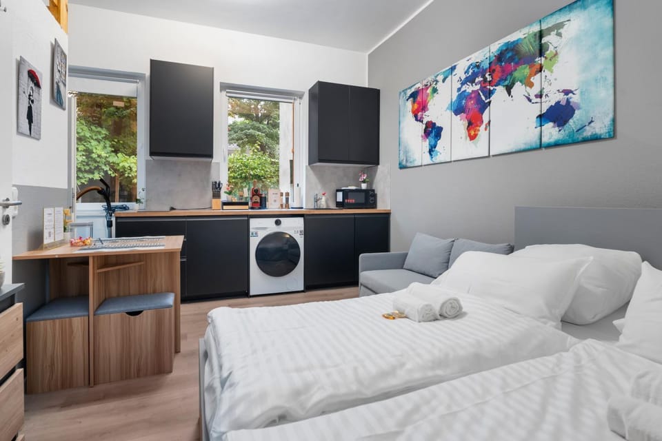 Photo of the whole room, Dining area, Bedroom, washing machine, dryer, kitchen